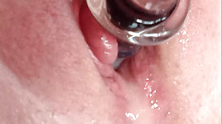 Granny with a big clit and wet pussy has an intense orgasm