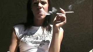 Smoking fetish with a teen brunette