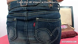 Putting both legs behind her head and sucking toes