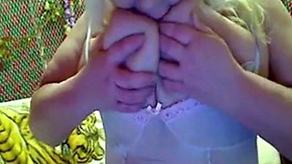 Big-Titted Granny Self-Sucks on Webcam