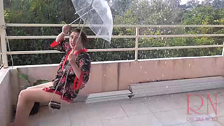 Cute lady swinging without panties, hiding from the rain under an umbrella. 185 3