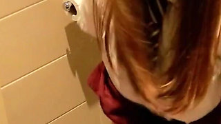Student Taking A Piss on the Toilet