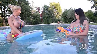 Floating Gazongas: Two British Bombshells With Big Tits In The Pool