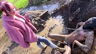 Extreme ballbusting in the mud Miss Eva Ray