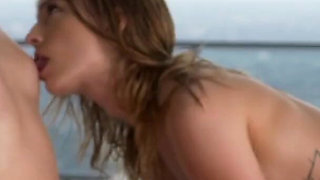 Two gorgeous babes having fun near the pool