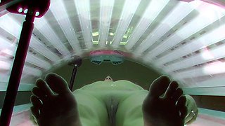 Beautiful MILF in solarium