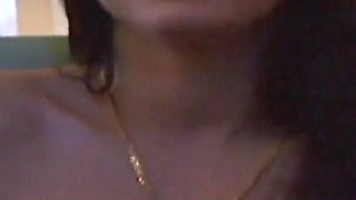 Milf brunette with pierced fake tits gets a wet facial