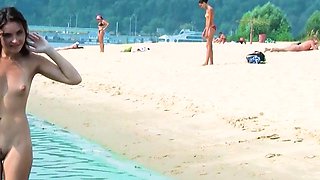 Hot young nudists secretly filmed having fun