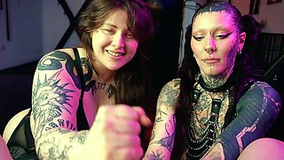 Two tattooed emo girls have fun with one dick