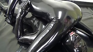 Latex maid becomes rubber creature