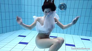 Gorgeous Aneta strips down and swims at the pool