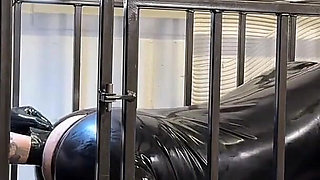 Anal Stretching a Caged Gimp