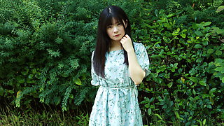 Ringo Fujii acting adorable while posing in the woods