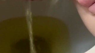 She pees in the toilet beautiful beautiful golden shower on toilet