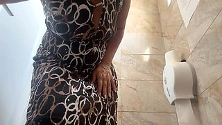 Horny Mature Woman Masturbates in a Public Toilet and Fingers Her Pussy to Orgasm