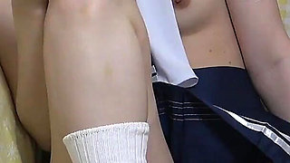 Apartment Exclusively for Japanese Girls, a Room Where Skinny Girl Mini Skirt, No Bra Apron Uniform, Thong Is Sitting on Chair