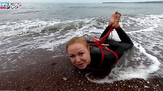Hogtied in a Wetsuit - Rope Bondage Escape Challenge on the Beach