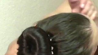 Big ass brunette enjoying a warm load in her mouth
