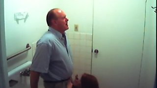 Bathroom slut sucks dick in restroom