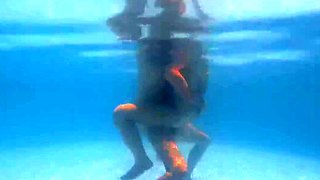 Busty milf goes skinny dipping and gets dicked down in a pool