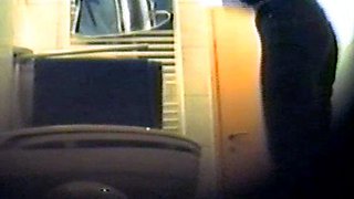 Girl using the toilet and filmed by voyeur 1