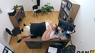 Daruma Rai and Stanley Johnson in a hot office scene
