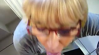 My nerdy wife in glasses sucks dick obediently
