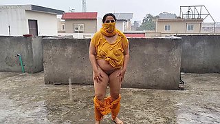 Pakistani mommy savors the rainfall