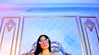 Busty curly brunette with big boobs fucks on couch