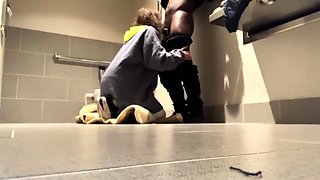 Amateur brunette drilled by black guy in public toilet
