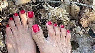 Melove Sexy Small Feet with Red Toe Nails in Leaves