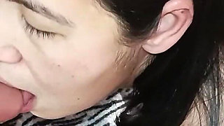 A Korean Woman Practices Blowjob in Front of a Mirror