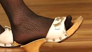 Retro Dangling in Patterned Nylons & Classic Wooden Mules