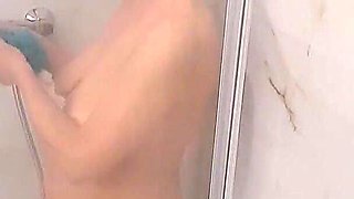 Older Blondie with Big Boobs Taking Steamy Shower
