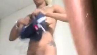Slim Petite Ebony Milf Putting on Dress