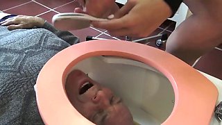 Toilet trash for pedicures and spit!  Madame Carla degrades her old slave as a pedicure slave and spittoon!