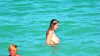 Shameless amateur fisted on a public beach