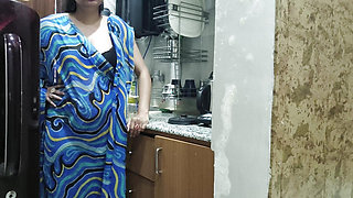 Indian stepmom watches and enters her stepson's Kitchen to fuck him.