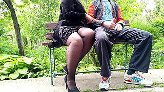 Unfamiliar MILF in pantyhose jerked off my cock in the park on a bench