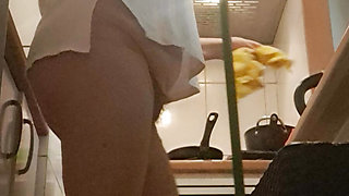 Mom cleans the kitchen floor