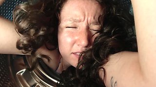 A hot brunette girlfriend gets stuck and banged in a washing machine