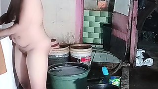 Washing clothes while naked