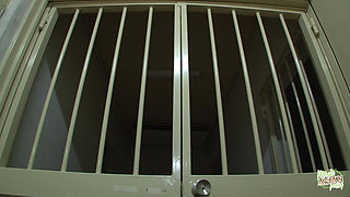 This Female Was by a Police Guard in the Prison Where She Was Held