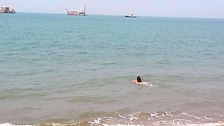 Voyeur - Hot MILF Naked on the Beach and Swimming in the Sea