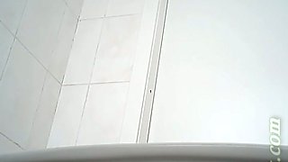 Hairy dirty pussy of a pale skin white chick in the toilet room