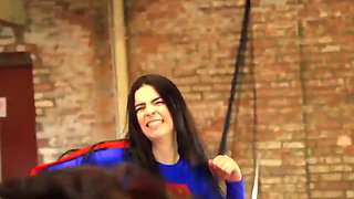 Superheroine Supergirl Battles and Is Defeated by Dark Supergirl