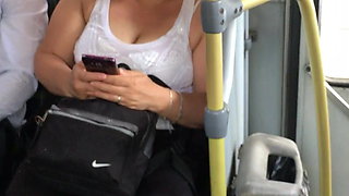 MILF tits bouncing on the bus