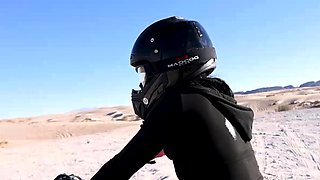 Showing perfect ass while riding an ATV