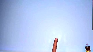 Cute amateur teen girl toying her pussy in bed on cam