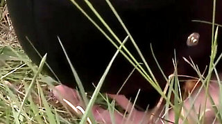 Herrin enslaves man and enjoys foot fetish outdoor